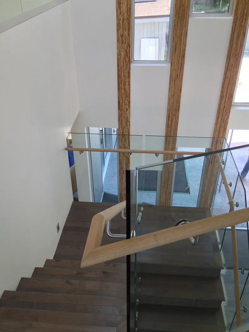 Custom glass railing installation in Greater Vancouver residence