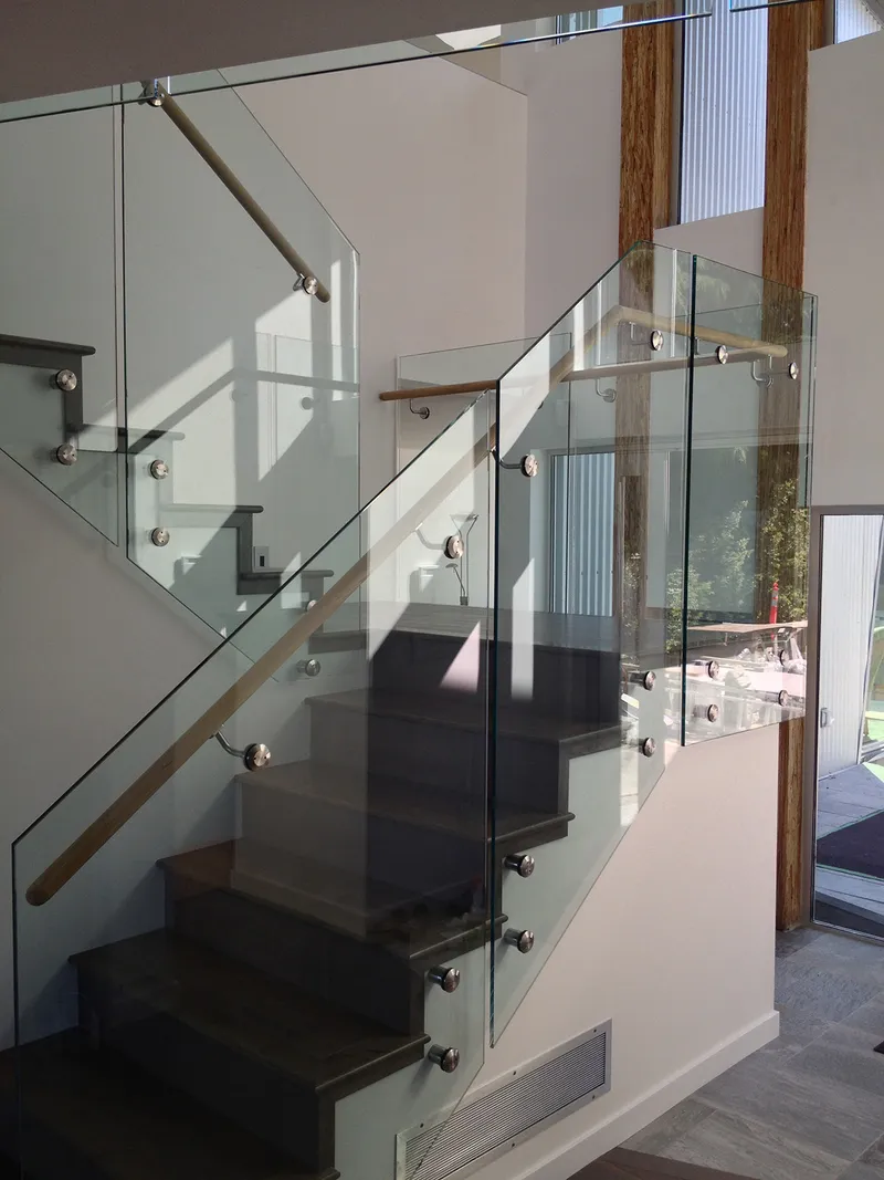 Interior glass stair railing in Vancouver residence