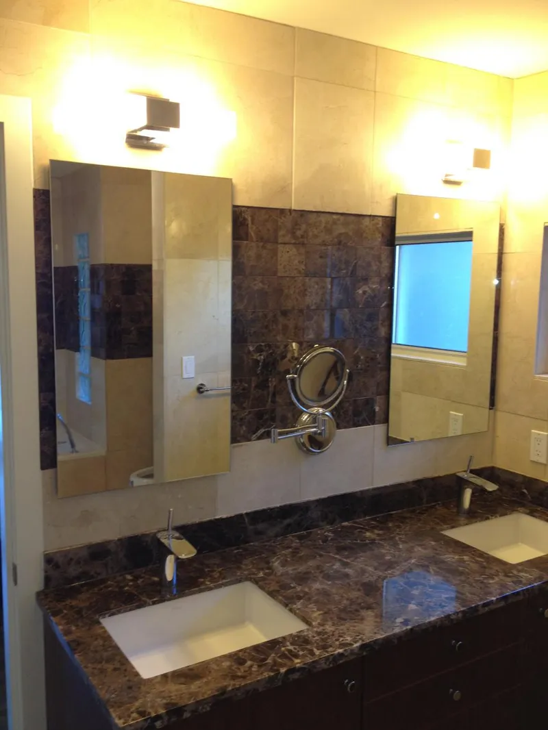 Full wall mirror installation in Vancouver residence